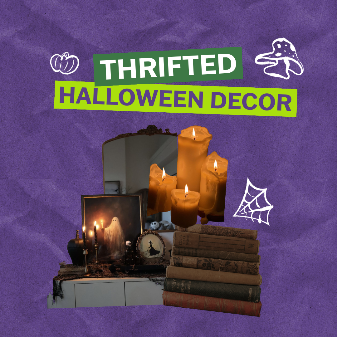A purple crumpled paper background with text that reads "THRIFTED HALLOWEEN DECOR" There are cutout images of a halloween decorated tabletop and mirror, a stack of books, and four lit candles.