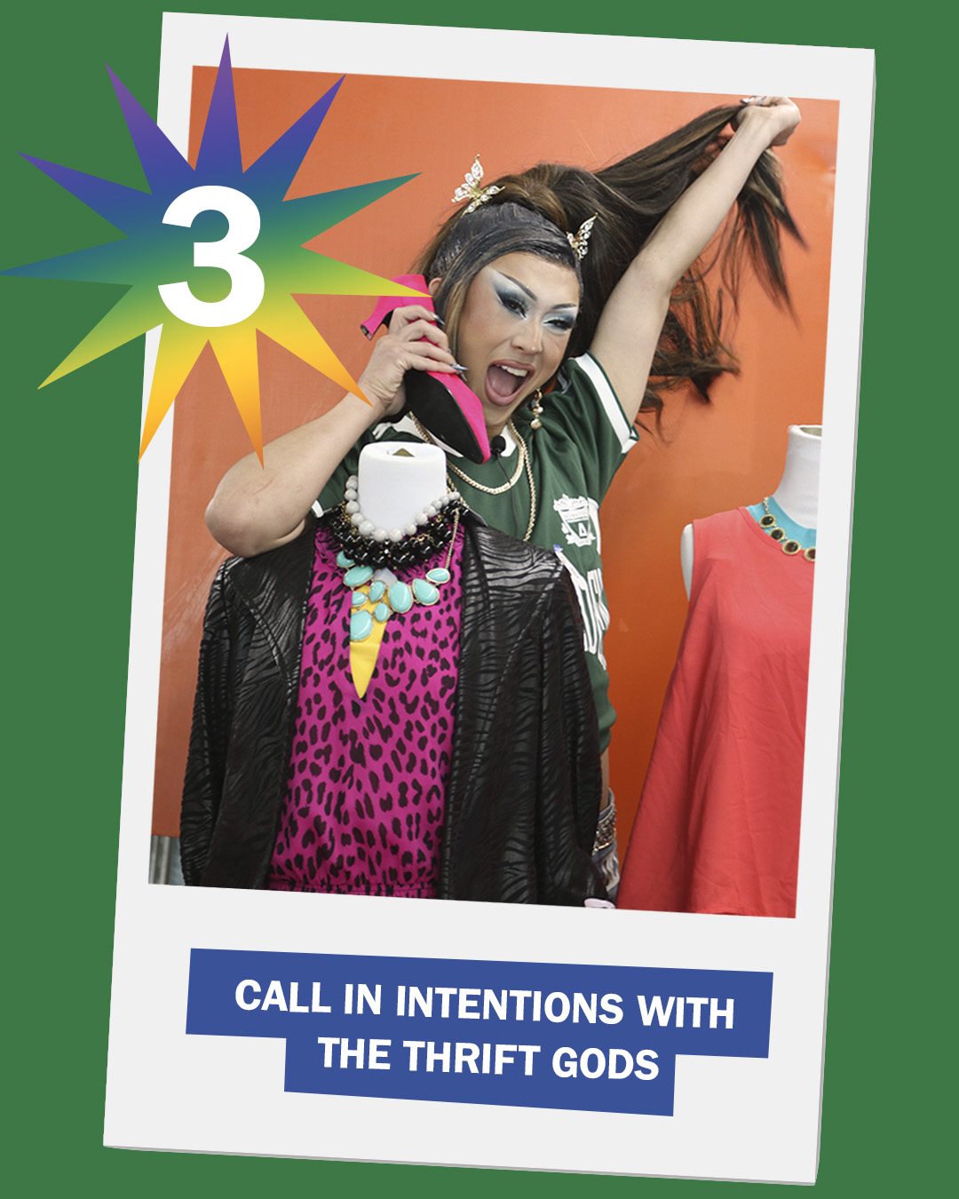 There is an image of drag queen Viper Fengz posing in front of an orange background. There is a mannequin in front of her with a pink cheetah top and black leather jacket. Viper Fengz is holding a pink shoe as if it is a phone. The text reads "3: call in intentions with the thrift gods"